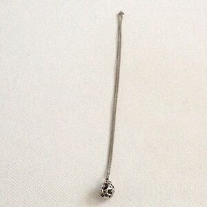 Elegant Silver “Cosmic Egg” Pendant Necklace with Blue Stone